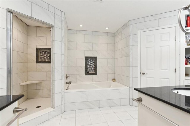 91 Rosedown Dr, Destrehan, LA 70047 - full bath featuring a garden tub, vanity, a tile shower, recessed lighting, and tile patterned floors