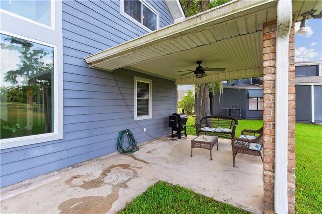 91 Rosedown Dr, Destrehan, LA 70047 - view of patio / terrace featuring a ceiling fan, a grill, and outdoor lounge area