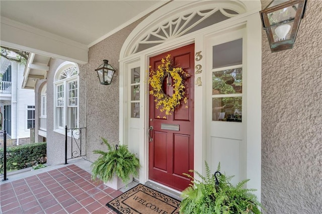 324 Fairway Dr, New Orleans, LA 70124 - property entrance with stucco siding and a porch