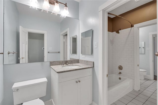 324 Fairway Dr, New Orleans, LA 70124 - bathroom with toilet, vanity, tub / shower combination, and tile patterned floors