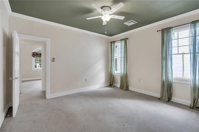 324 Fairway Dr, New Orleans, LA 70124 - spare room with light carpet, a ceiling fan, plenty of natural light, and ornamental molding