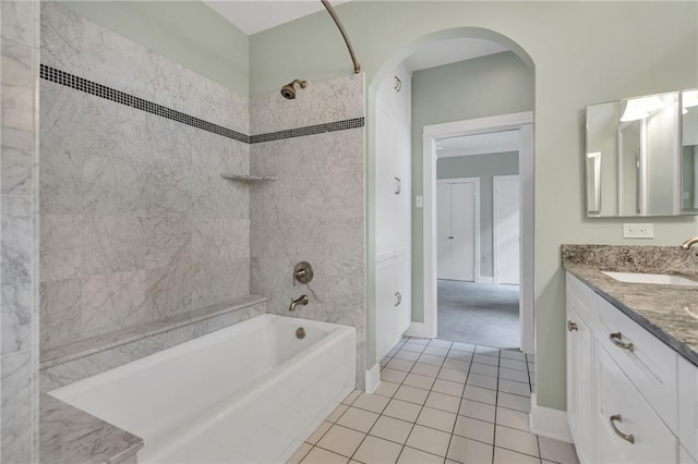 324 Fairway Dr, New Orleans, LA 70124 - full bathroom with vanity, shower / bath combination, tile patterned flooring, and baseboards