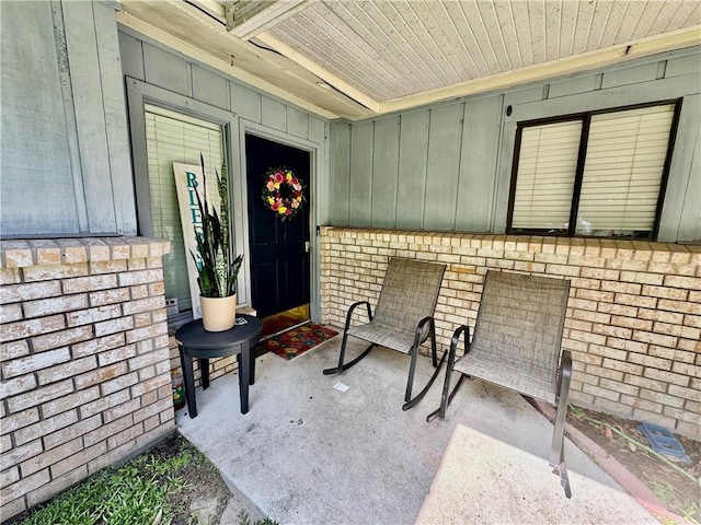 120 Whisperwood Blvd, Slidell, LA 70458 - view of exterior entry featuring board and batten siding and brick siding