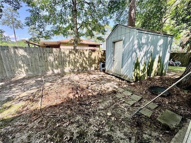 120 Whisperwood Blvd, Slidell, LA 70458 - view of shed with a fenced backyard