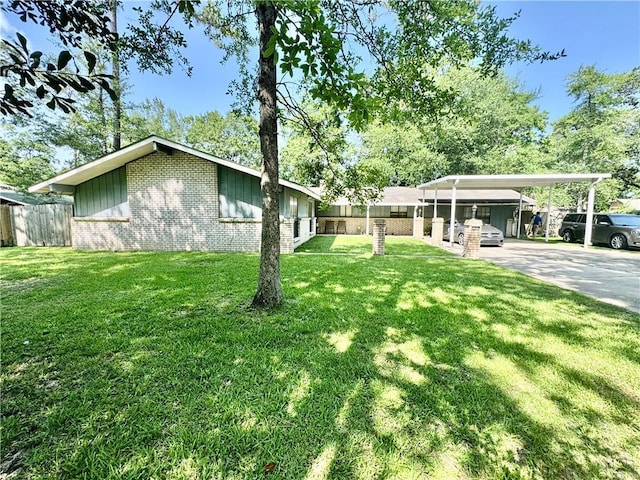 120 Whisperwood Blvd, Slidell, LA 70458 - view of yard featuring concrete driveway
