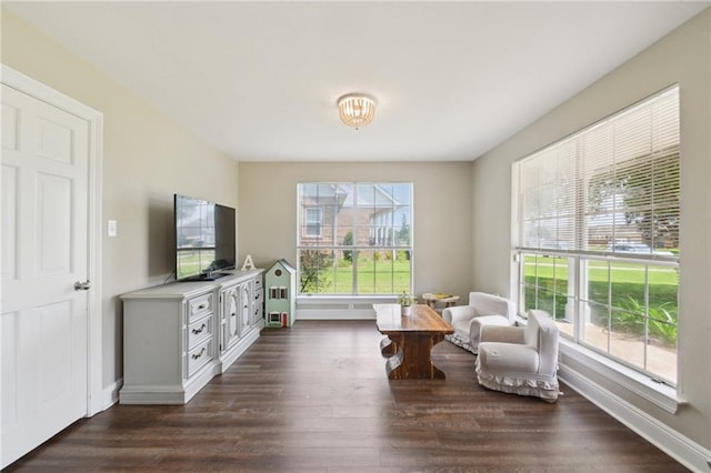 2351 Ormond Blvd, Destrehan, LA 70047 - living area with plenty of natural light, dark wood-style flooring, and baseboards