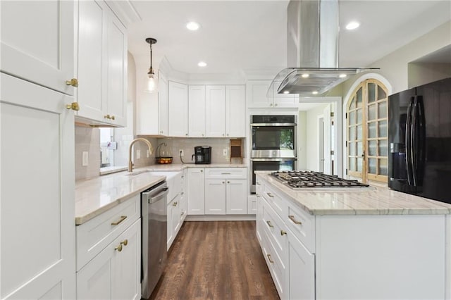 2351 Ormond Blvd, Destrehan, LA 70047 - kitchen featuring stainless steel appliances, island range hood, decorative backsplash, white cabinets, and recessed lighting
