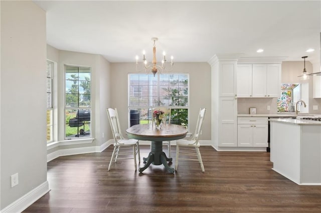 2351 Ormond Blvd, Destrehan, LA 70047 - dining area with a chandelier, baseboards, dark wood finished floors, and recessed lighting