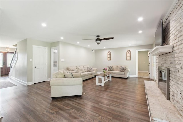 2351 Ormond Blvd, Destrehan, LA 70047 - living area featuring a fireplace, baseboards, dark wood finished floors, recessed lighting, and ceiling fan