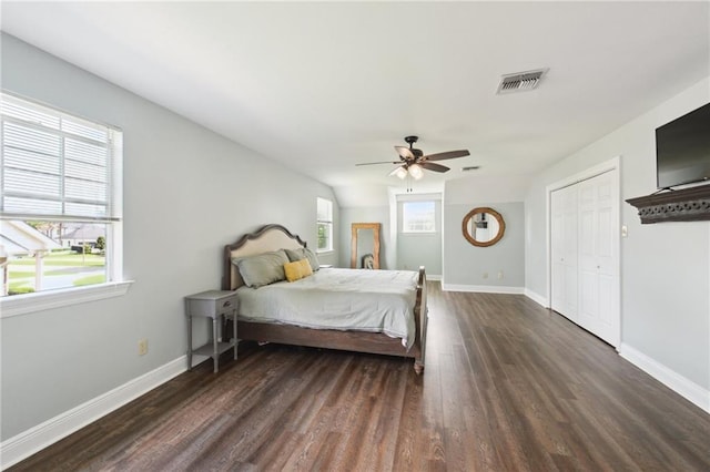 2351 Ormond Blvd, Destrehan, LA 70047 - bedroom featuring dark wood-style flooring, baseboards, and a ceiling fan
