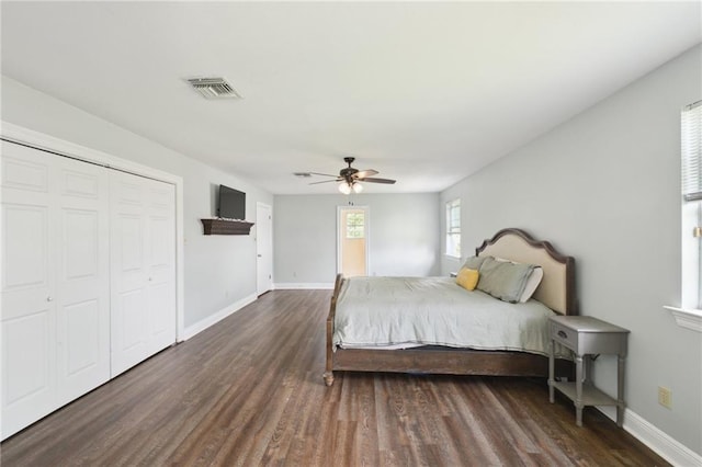 2351 Ormond Blvd, Destrehan, LA 70047 - bedroom featuring wood finished floors, baseboards, ceiling fan, and a closet
