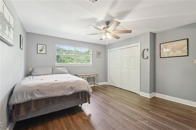 2351 Ormond Blvd, Destrehan, LA 70047 - bedroom featuring wood finished floors, a closet, baseboards, and a ceiling fan