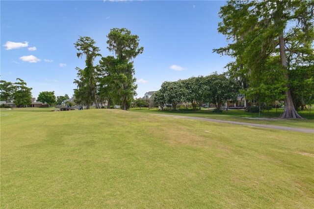 2351 Ormond Blvd, Destrehan, LA 70047 - view of home's community with a yard