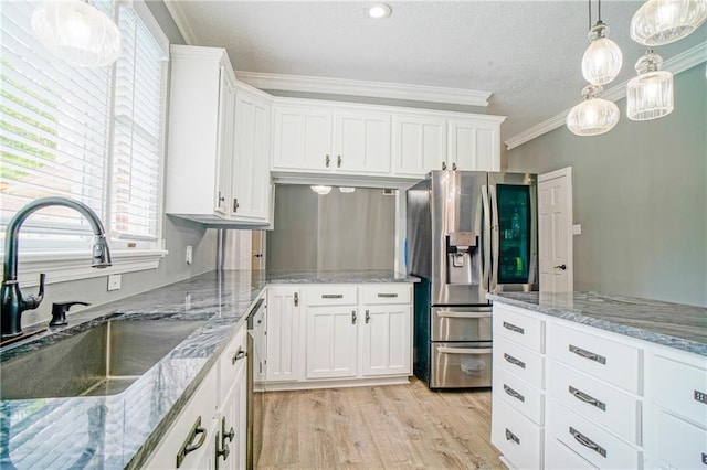 115 Devereux Dr, Slidell, LA 70461 - kitchen featuring appliances with stainless steel finishes, crown molding, a sink, white cabinetry, and a textured ceiling