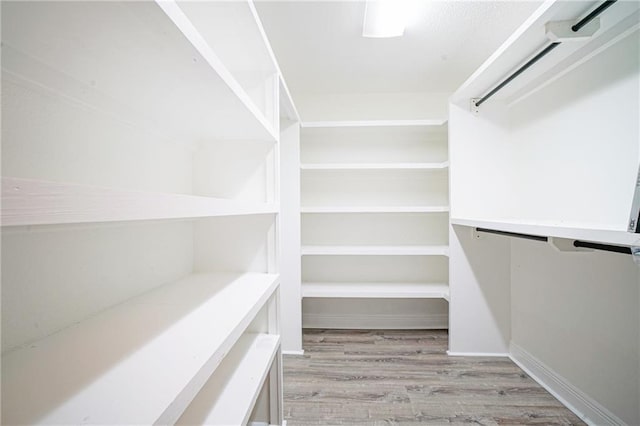 115 Devereux Dr, Slidell, LA 70461 - spacious closet with light wood-style flooring