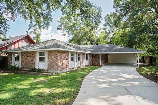 9509 Robin Ln, River Ridge, LA 70123 - single story home featuring brick siding, concrete driveway, and a carport