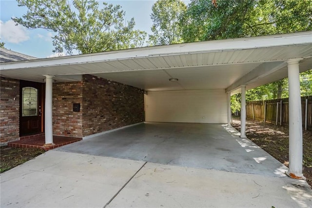 9509 Robin Ln, River Ridge, LA 70123 - view of parking / parking lot featuring a carport