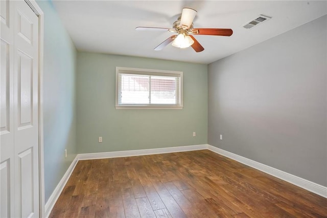 9509 Robin Ln, River Ridge, LA 70123 - spare room with hardwood / wood-style floors, a ceiling fan, and baseboards