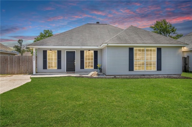70382 10th St, Covington, LA 70433 - back of house at dusk with roof with shingles