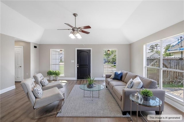 70382 10th St, Covington, LA 70433 - living area featuring lofted ceiling, wood finished floors, baseboards, and a ceiling fan