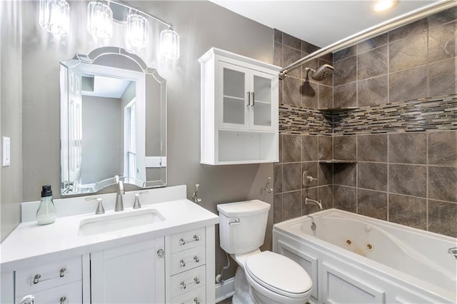 70382 10th St, Covington, LA 70433 - bathroom with toilet, vanity, and a combined bath / shower with jetted tub