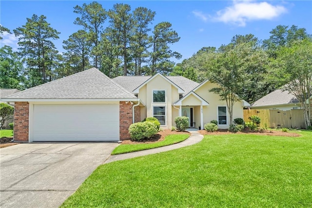 1833 Octavia Dr, Mandeville, LA 70448 - view of front of house featuring concrete driveway, an attached garage, brick siding, stucco siding, and a shingled roof