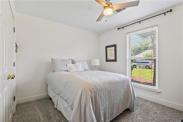 1833 Octavia Dr, Mandeville, LA 70448 - bedroom with carpet floors, baseboards, and a ceiling fan