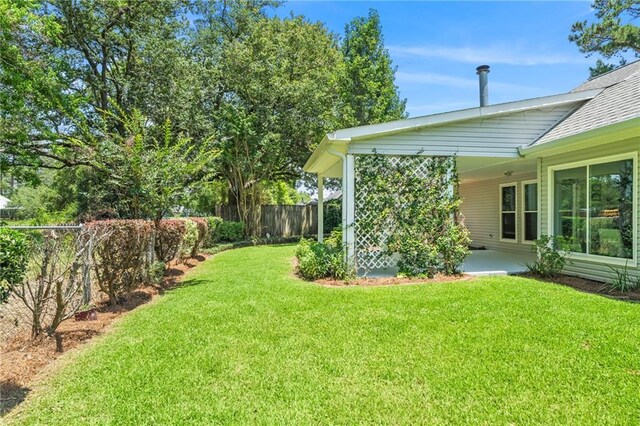 1833 Octavia Dr, Mandeville, LA 70448 - view of yard featuring a patio