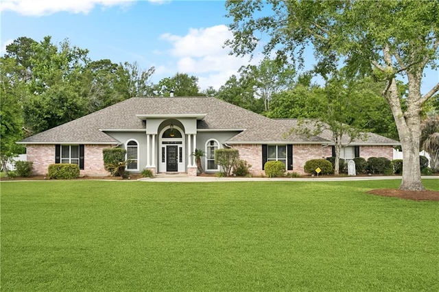 209 Partridge Rd, Slidell, LA 70461 - view of front of home with a front lawn and roof with shingles