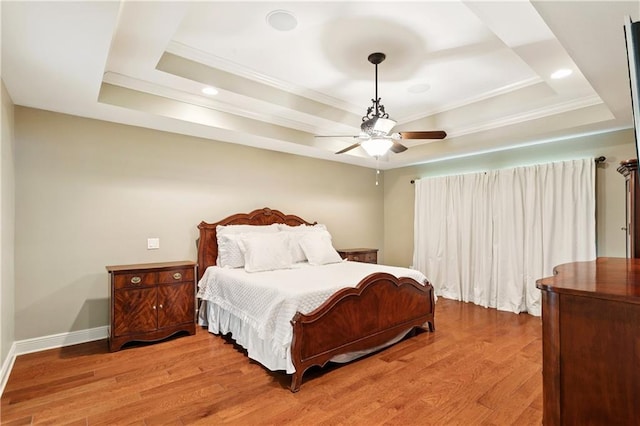 209 Partridge Rd, Slidell, LA 70461 - bedroom featuring a raised ceiling, wood finished floors, ornamental molding, recessed lighting, and baseboards