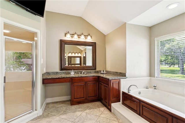 209 Partridge Rd, Slidell, LA 70461 - full bath featuring a bath, a shower stall, vanity, and vaulted ceiling