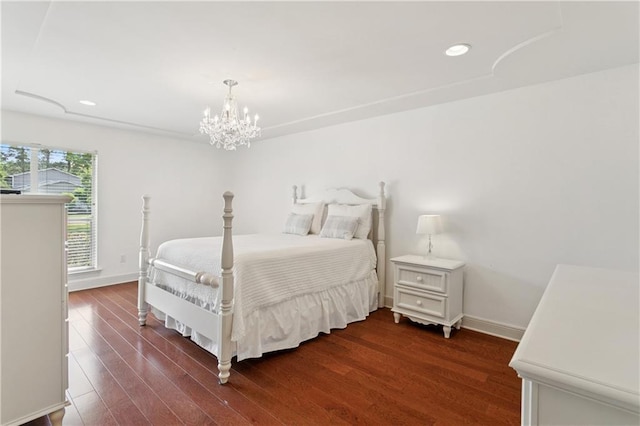 209 Partridge Rd, Slidell, LA 70461 - bedroom with dark wood-style flooring, a chandelier, recessed lighting, and baseboards