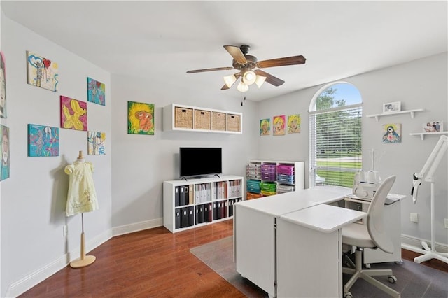 209 Partridge Rd, Slidell, LA 70461 - home office featuring a ceiling fan, baseboards, and dark wood-style flooring