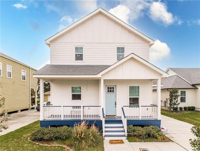 5 Leeward Ct, New Orleans, LA 70131 - view of front of property featuring board and batten siding, covered porch, and roof with shingles