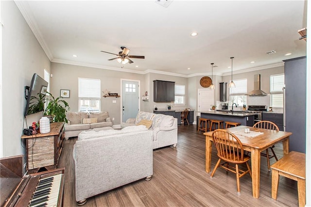 5 Leeward Ct, New Orleans, LA 70131 - living area featuring wood finished floors, recessed lighting, a ceiling fan, and ornamental molding