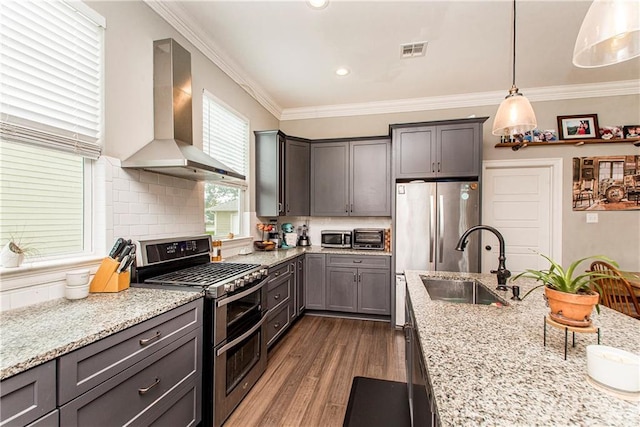 5 Leeward Ct, New Orleans, LA 70131 - kitchen featuring extractor fan, double oven range, ornamental molding, light stone countertops, and dark wood finished floors