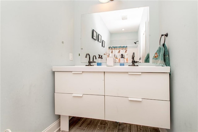 5 Leeward Ct, New Orleans, LA 70131 - full bathroom featuring double vanity and wood finished floors