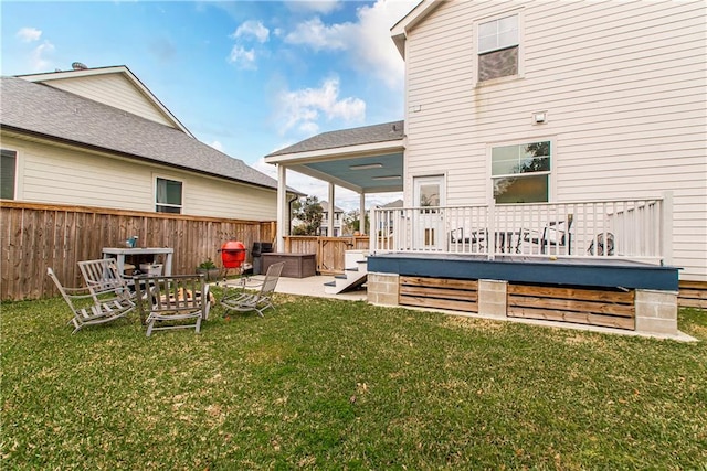 5 Leeward Ct, New Orleans, LA 70131 - rear view of house featuring a wooden deck and a patio area