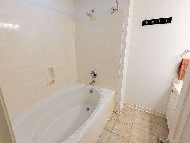 653 Beaulieux St, Mandeville, LA 70448 - full bath featuring vanity, tile patterned flooring, baseboards, and shower / bath combination