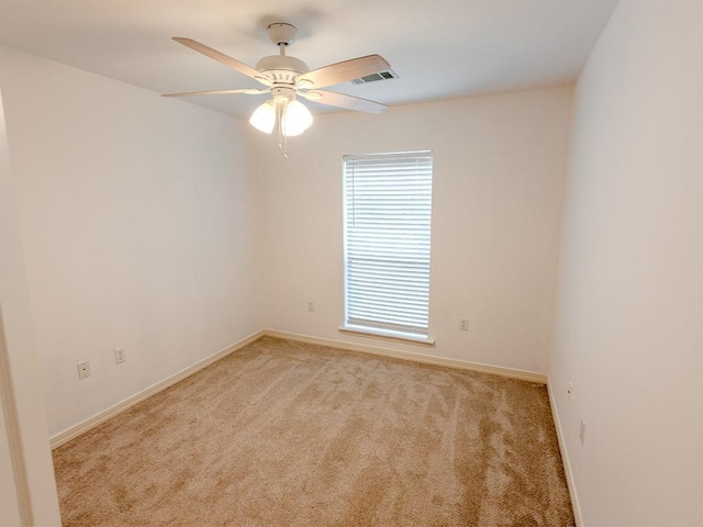 653 Beaulieux St, Mandeville, LA 70448 - unfurnished room with light carpet, ceiling fan, and baseboards