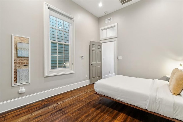 222527 Iberville St, New Orleans, LA 70119 - bedroom with hardwood / wood-style floors and baseboards