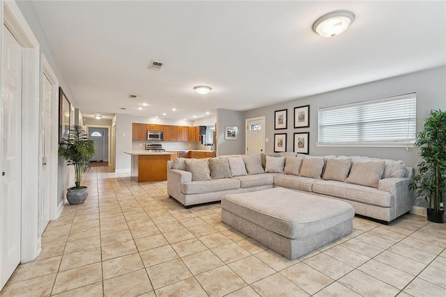 4616 Kawanee Ave, Metairie, LA 70006 - living area with light tile patterned flooring and recessed lighting