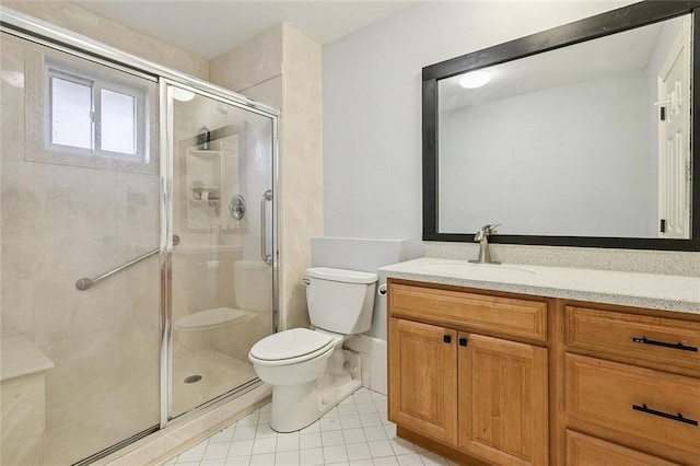 4616 Kawanee Ave, Metairie, LA 70006 - full bathroom featuring vanity, tile patterned flooring, and a shower stall