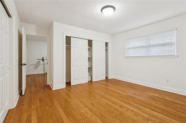 4616 Kawanee Ave, Metairie, LA 70006 - unfurnished bedroom featuring wood finished floors and baseboards