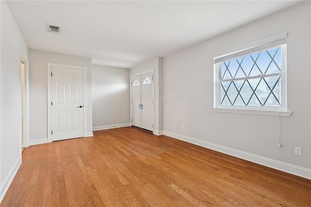 4616 Kawanee Ave, Metairie, LA 70006 - foyer featuring light wood-style floors and baseboards