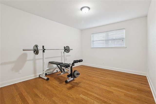 4616 Kawanee Ave, Metairie, LA 70006 - exercise room featuring baseboards and wood finished floors