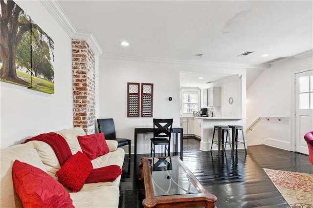 1030 Kerlerec St Unit 4, New Orleans, LA 70116 - living room with ornamental molding, dark wood-style flooring, recessed lighting, and baseboards
