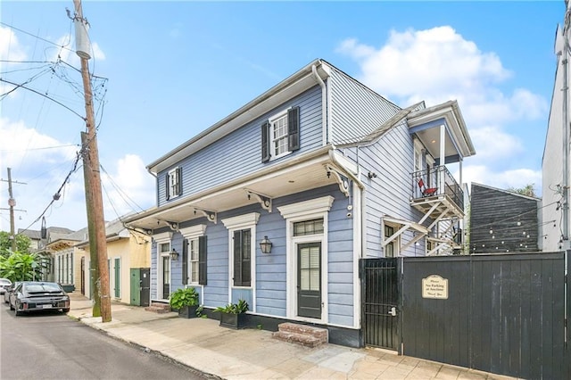 1030 Kerlerec St Unit 4, New Orleans, LA 70116 - view of front of property featuring a gate