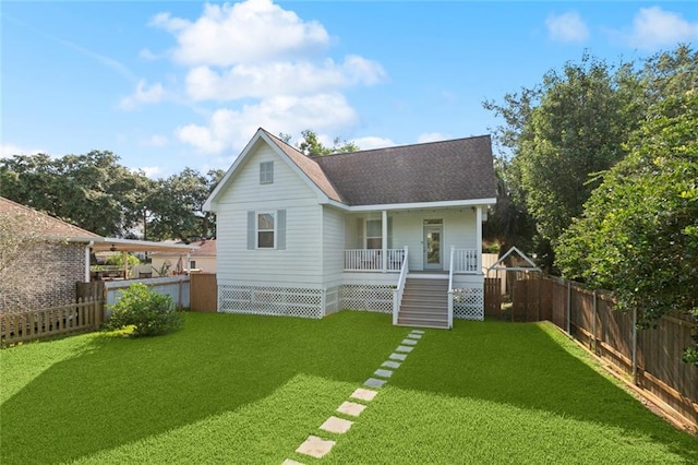 6945 Milne Blvd, New Orleans, LA 70124 - back of house with roof with shingles, a porch, and stairs