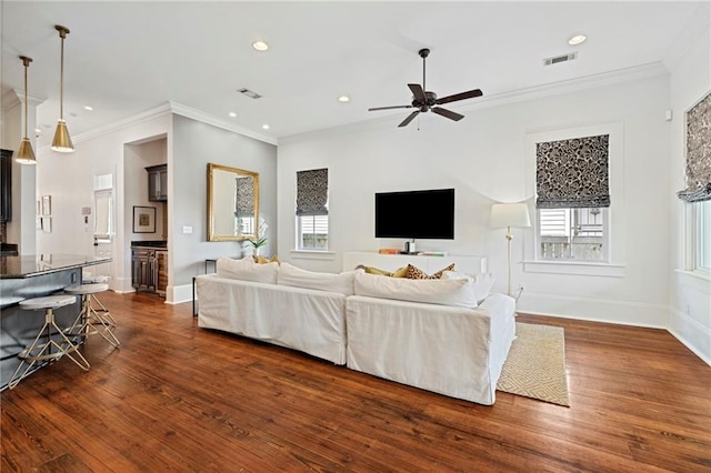 1215 Saint Andrew St, New Orleans, LA 70130 - living room with ceiling fan, dark wood-type flooring, crown molding, recessed lighting, and baseboards